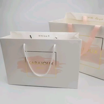 Бумажный пакет с логотипом, напечатанный на заказ, роскошные оптовые подарочные хозяйственные сумки с ручками для малого бизнеса 11