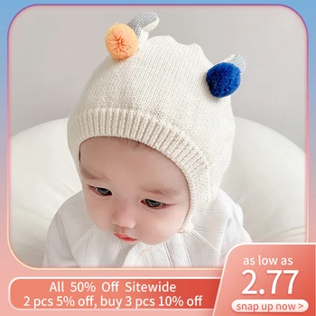 Детская зимняя теплая шапочка-бомбер для малышей, вязаная шапка из мягкой толстой шерсти для малышей, милые шапочки с шариками для защиты ушей, Шапочка-наушник для новорожденных 1
